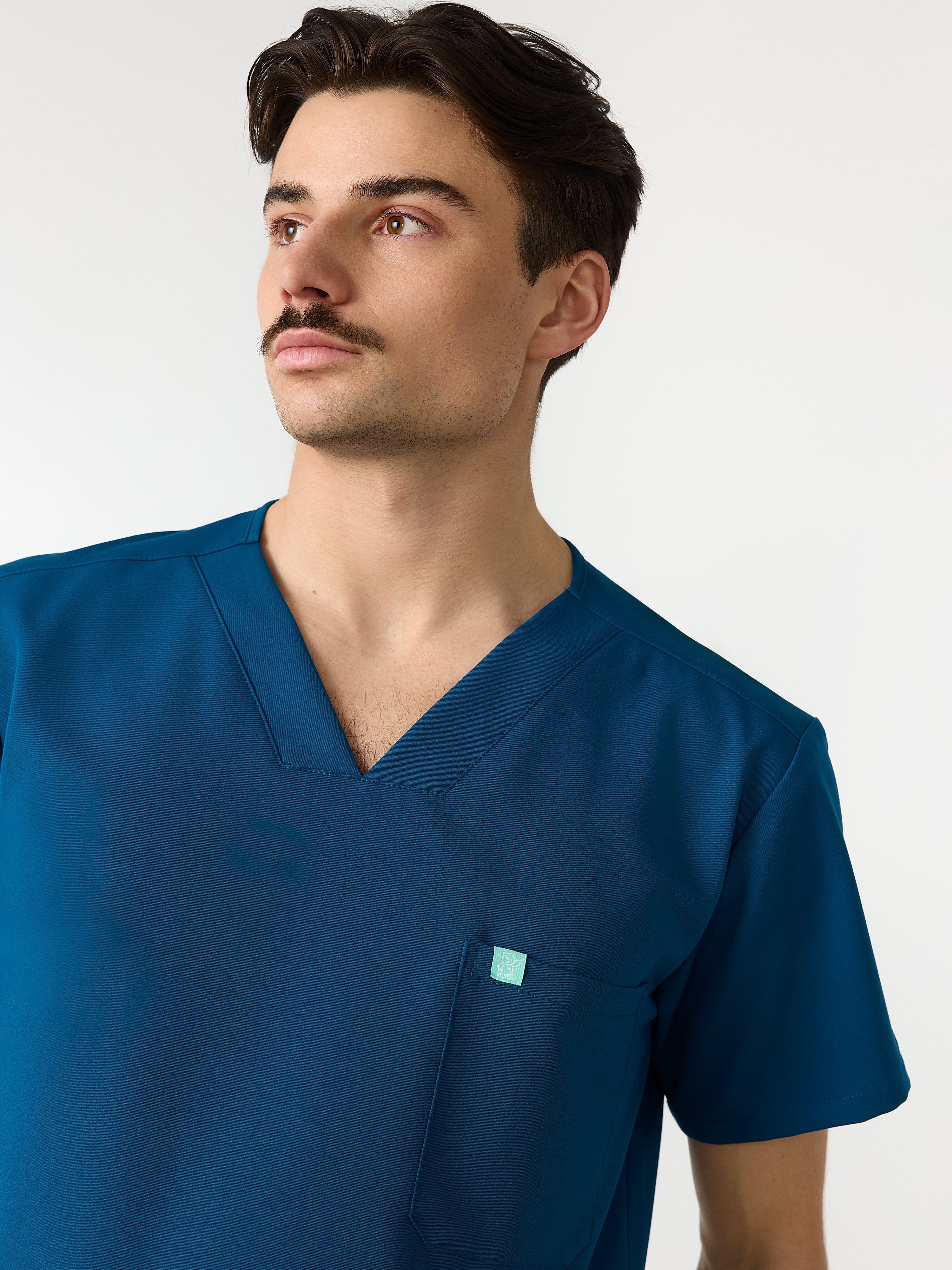 LOGAN RE-GARDE™ - OPAL BLUE - One Pocket Men's Scrub Top - SILVADUR™